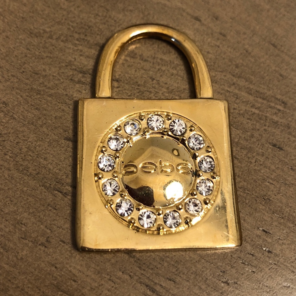 Bebe Gold Tone Lock Pendant with Rhinestones